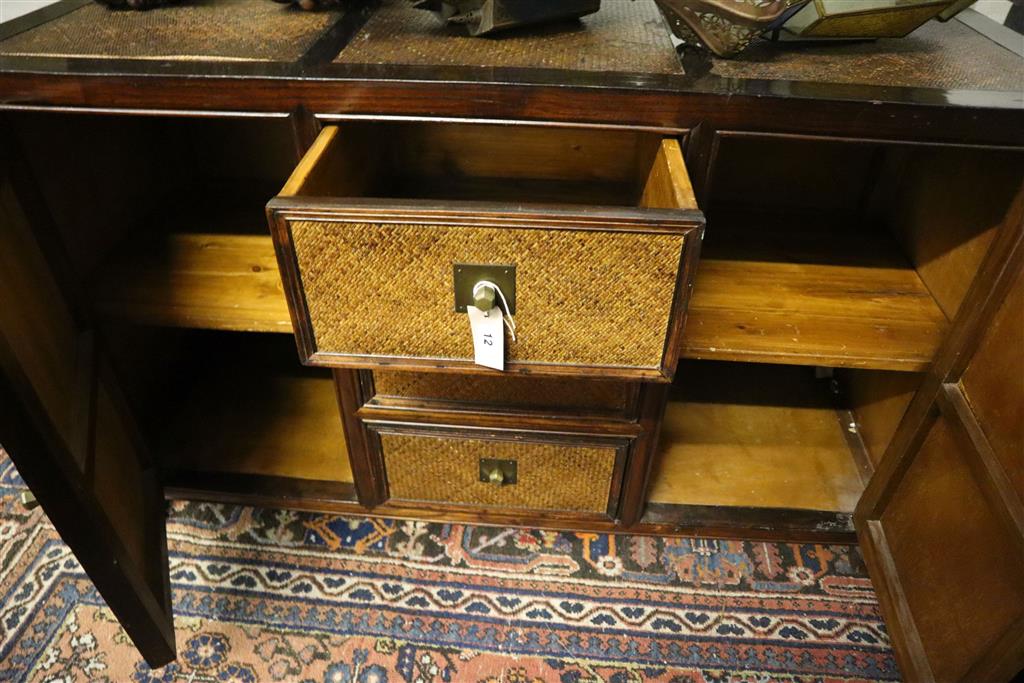 An Indian hardwood and rattan sideboard, width 140cm, depth 50cm, height 87cm